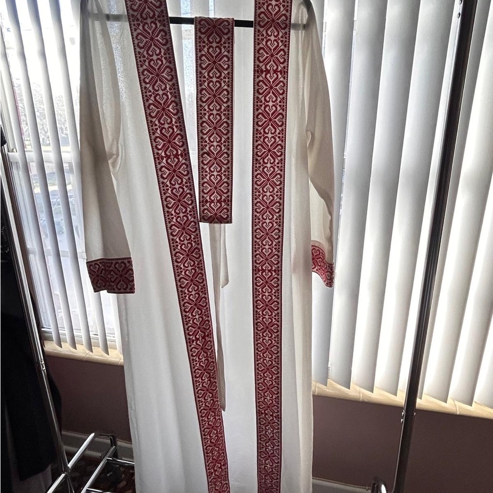 White Gown with Red Patterned Trim